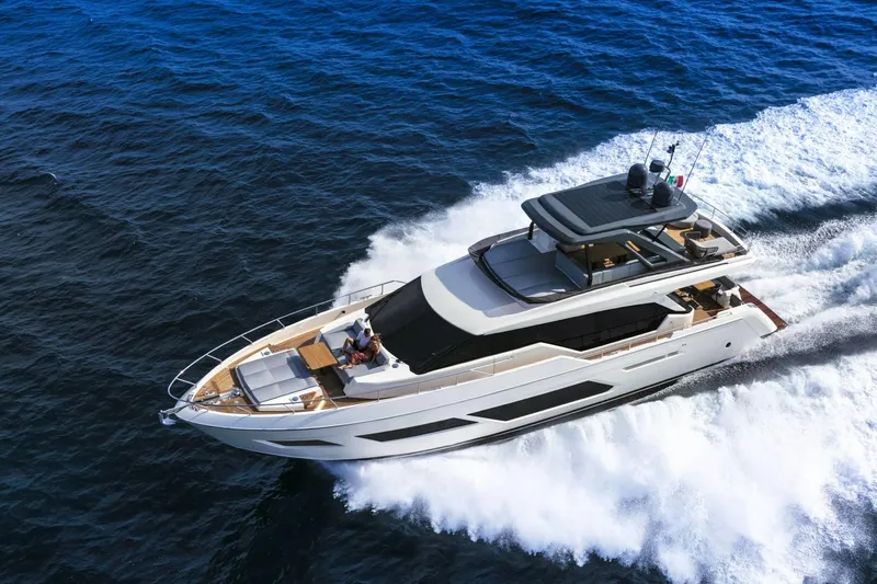  Yacht Photos Pics 2025 Ferretti Yachts 720 cruising on open sea, showcasing luxury and performance.