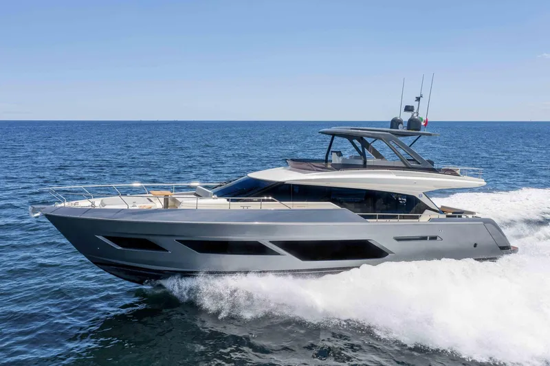  Yacht Photos Pics 2025 Ferretti Yachts 720 cruising on open sea, showcasing sleek design and luxury.
