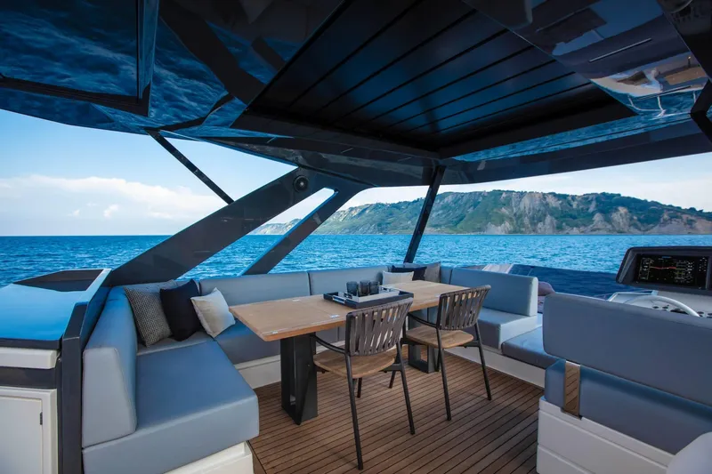  Yacht Photos Pics Luxurious 2025 Ferretti Yachts 720 interior with ocean view and elegant seating area.