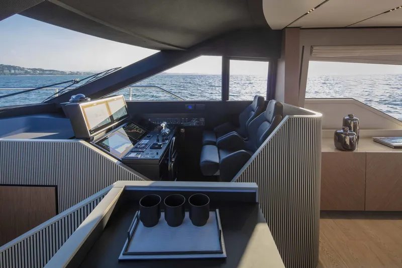 Yacht Photos Pics Interior of 2025 Ferretti Yachts 720, featuring modern helm and ocean view.