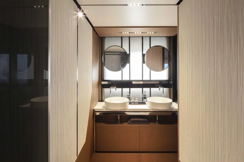  Yacht Photos Pics Luxurious bathroom in 2025 Ferretti Yachts 720 with dual sinks and modern design.