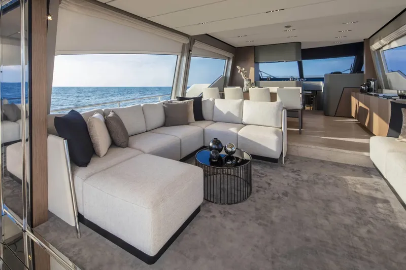  Yacht Photos Pics Luxurious interior of 2025 Ferretti Yachts 720 with elegant seating and ocean view.