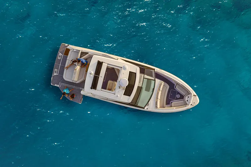  Yacht Photos Pics Manufacturer Provided Image: Aerial view of 2025 Sea Ray SLX 400 yacht on clear blue water.