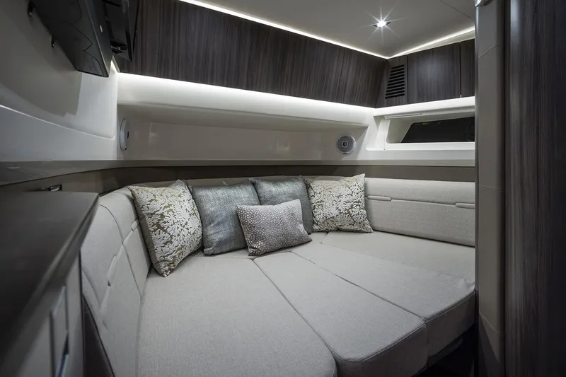  Yacht Photos Pics Manufacturer Provided Image: Luxurious interior cabin of 2025 Sea Ray SLX 400 yacht with plush seating.
