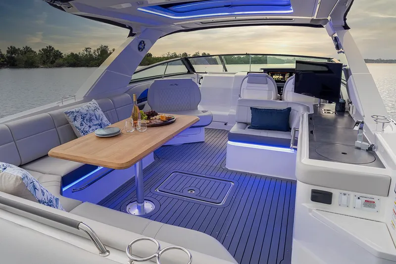  Yacht Photos Pics Manufacturer Provided Image: Luxurious 2025 Sea Ray SLX 400 yacht interior with elegant seating and ambient lighting.