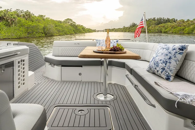  Yacht Photos Pics Manufacturer Provided Image: Luxurious 2025 Sea Ray SLX 400 boat interior with elegant seating and dining setup.