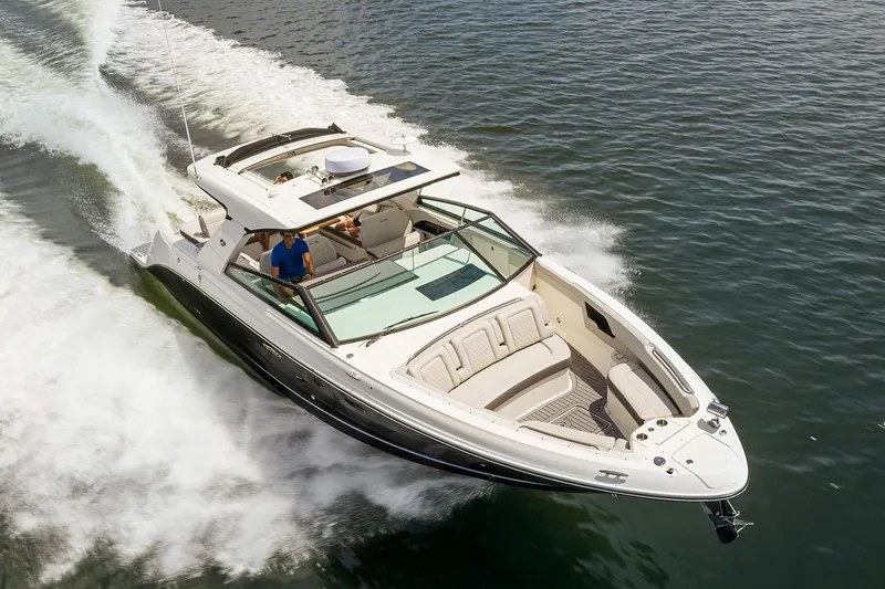  Yacht Photos Pics Manufacturer Provided Image: 2025 Sea Ray SLX 400 cruising on open water, showcasing sleek design and luxury features.