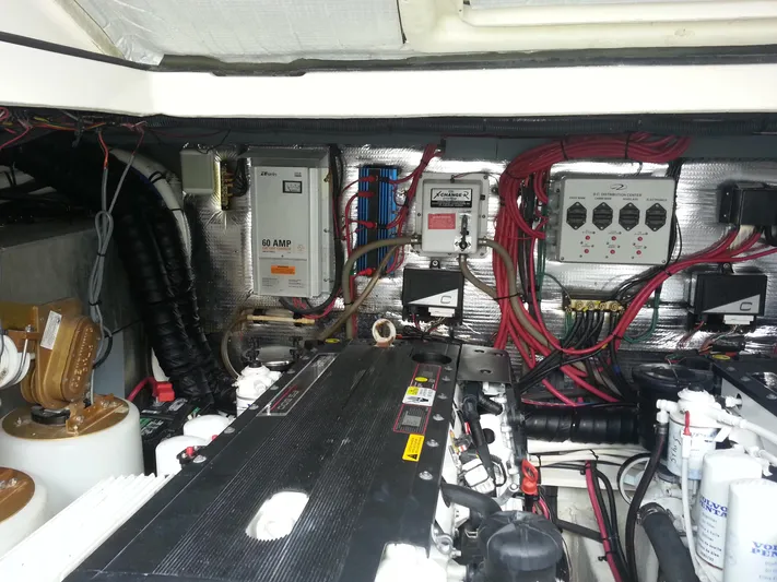 Johnny B Good Yacht Photos Pics Engine room of a 2007 Regal Commodore 4060 with wiring and equipment.