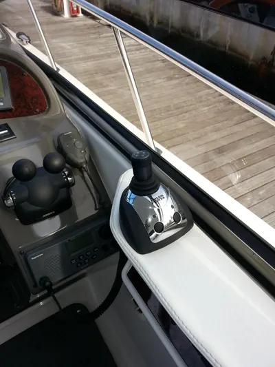 Johnny B Good Yacht Photos Pics Joystick control on 2007 Regal Commodore 4060 boat, dockside view.