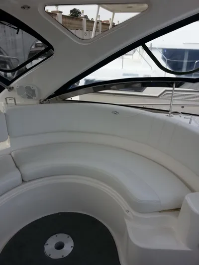 Johnny B Good Yacht Photos Pics 2007 Regal Commodore 4060 yacht interior with white seating and sleek design.