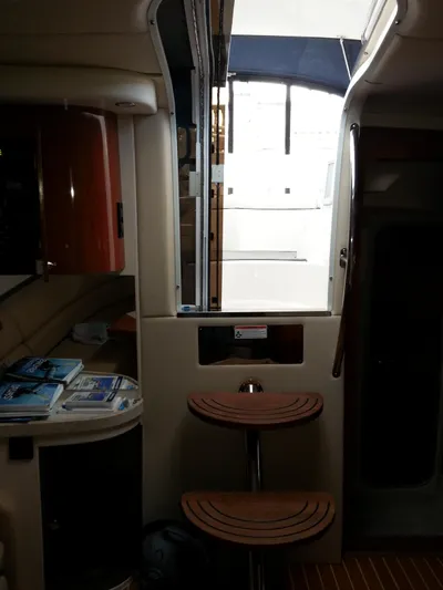 Johnny B Good Yacht Photos Pics Interior of 2007 Regal Commodore 4060 yacht with wooden steps and cabin view.