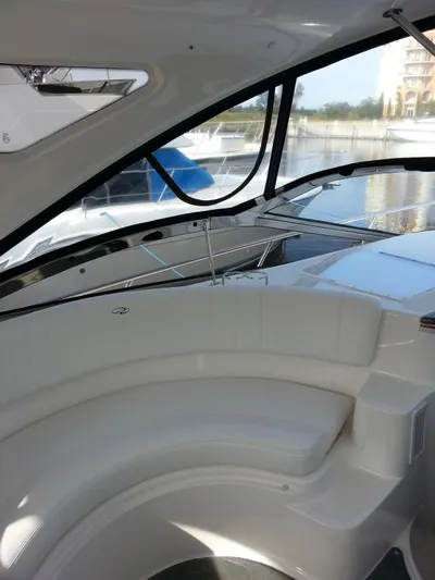 Johnny B Good Yacht Photos Pics 2007 Regal Commodore 4060 yacht interior with curved seating and large windows.