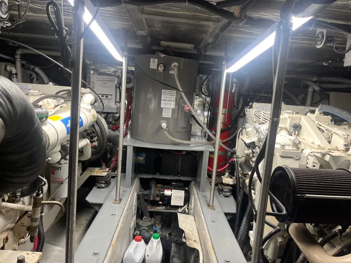  Yacht Photos Pics Engine room of 1999 Carver 530 Voyager Pilothouse with machinery and equipment.