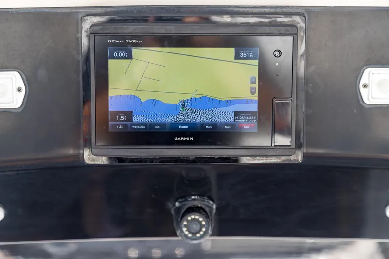  Yacht Photos Pics Garmin GPS display on 2016 Edgewater 368CC boat dashboard, showing navigation map.