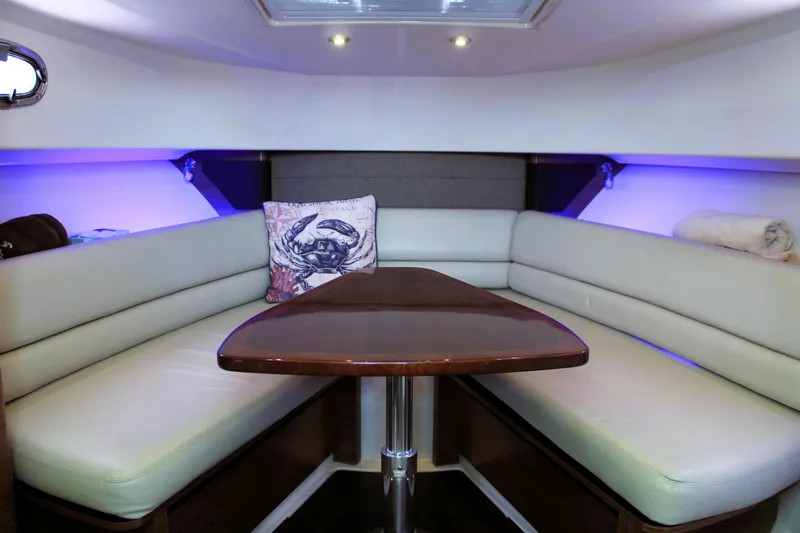 F-troop Yacht Photos Pics 2017 Boston Whaler 345 Conquest cabin with elegant seating and ambient lighting.
