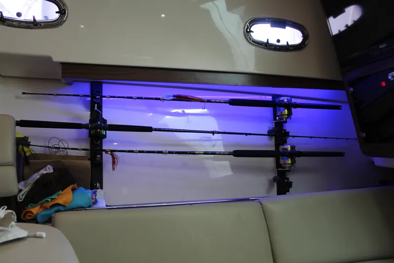F-troop Yacht Photos Pics Interior of 2017 Boston Whaler 345 Conquest with fishing rods and blue LED lighting.