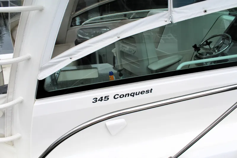 F-troop Yacht Photos Pics 2017 Boston Whaler 345 Conquest boat, showcasing sleek design and modern features.