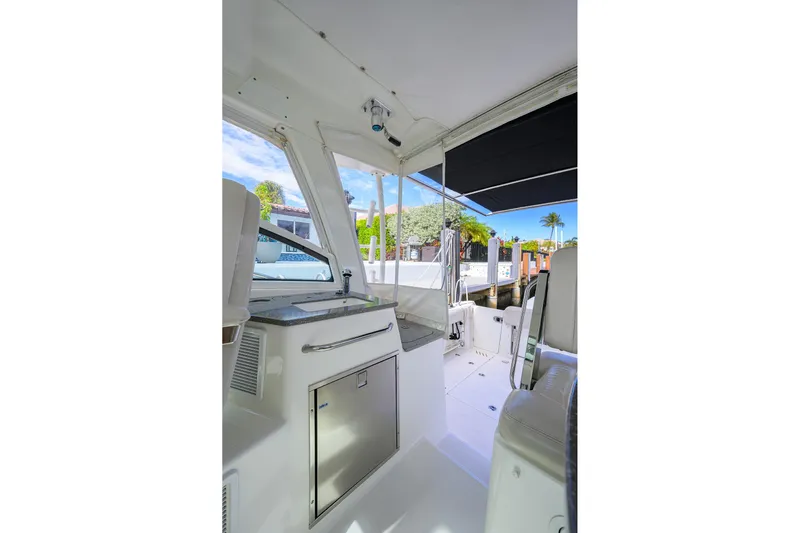 F-troop Yacht Photos Pics 2017 Boston Whaler 345 Conquest interior with sleek design and modern amenities.
