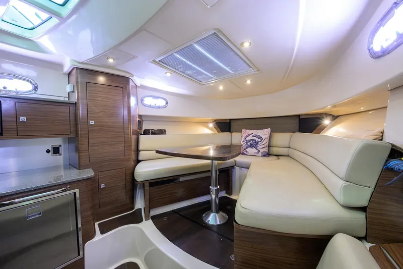 F-troop Yacht Photos Pics Luxurious interior of 2017 Boston Whaler 345 Conquest with plush seating and modern amenities.