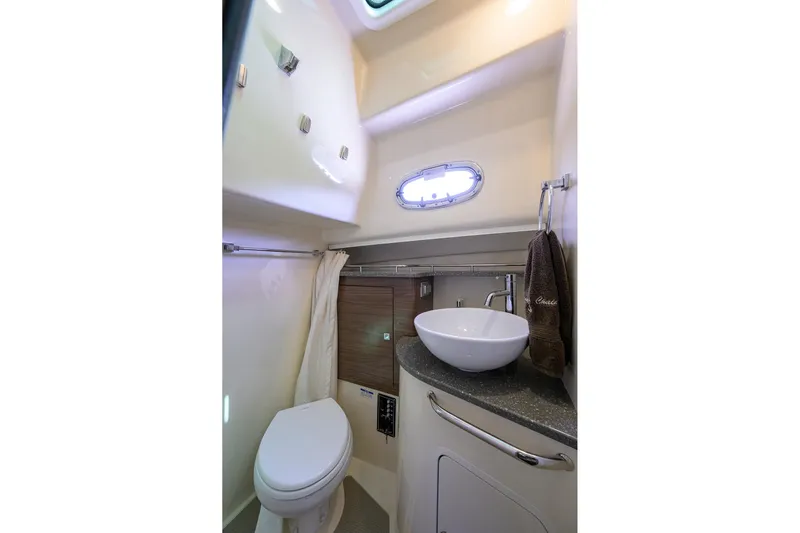 F-troop Yacht Photos Pics 2017 Boston Whaler 345 Conquest bathroom with modern sink and toilet.