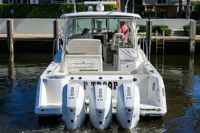 F-troop Yacht Photos Pics 2017 Boston Whaler 345 Conquest boat with triple 300 V8 engines on water.