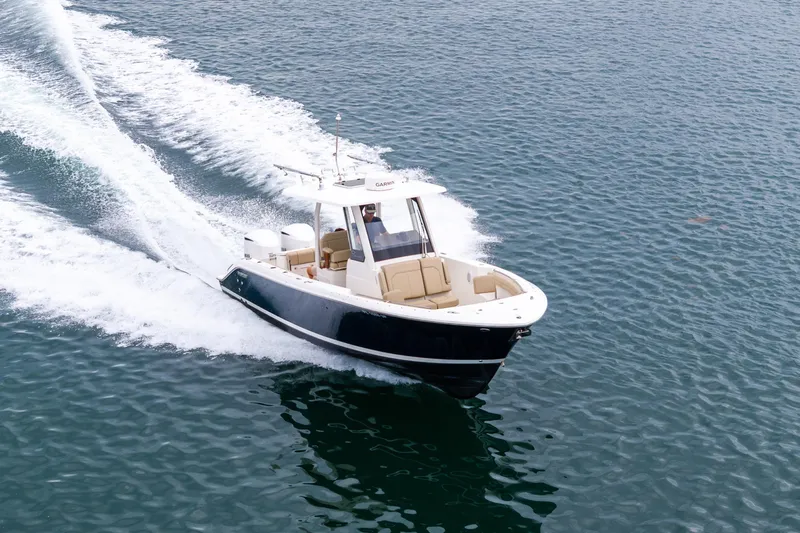 Little Perspective Yacht Photos Pics 2019 Pursuit S 288 Sport boat cruising on open water.
