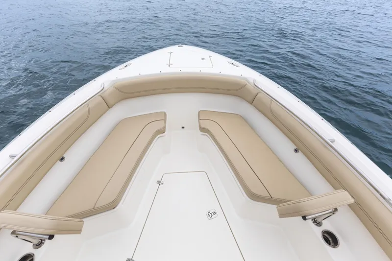 Little Perspective Yacht Photos Pics 2019 Pursuit S 288 Sport boat bow with beige seating on open water.