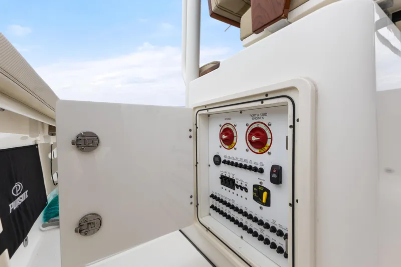 Little Perspective Yacht Photos Pics 2019 Pursuit S 288 Sport boat electrical panel with open access door.