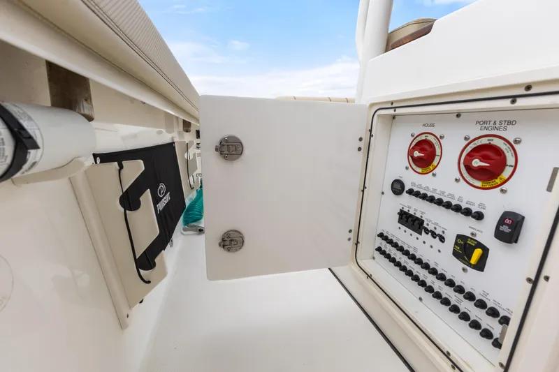 Little Perspective Yacht Photos Pics 2019 Pursuit S 288 Sport boat control panel with switches and dials.