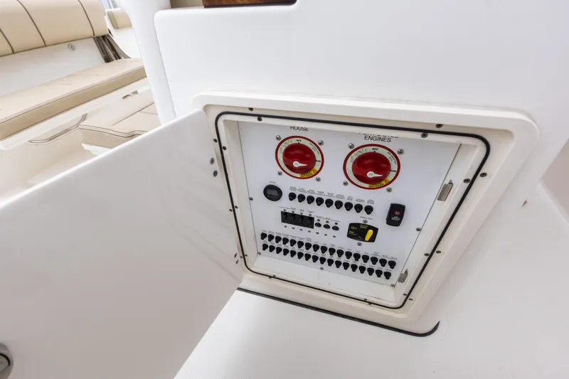 Little Perspective Yacht Photos Pics 2019 Pursuit S 288 Sport boat electrical panel with switches and controls.