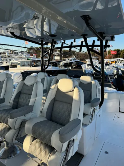  Yacht Photos Pics 2022 Invincible 40 Catamaran with luxurious seating and sleek design.