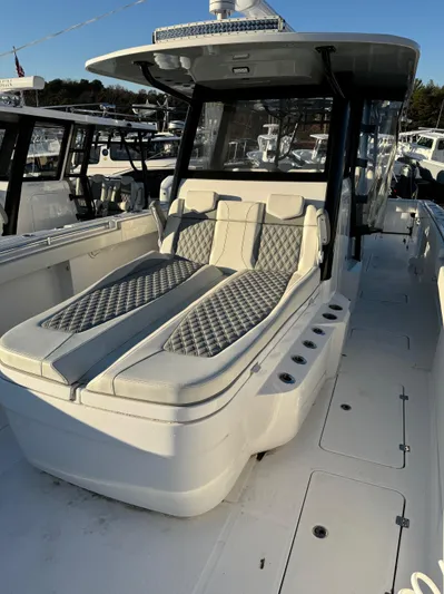  Yacht Photos Pics 2022 Invincible 40 Catamaran with luxurious seating and modern design.