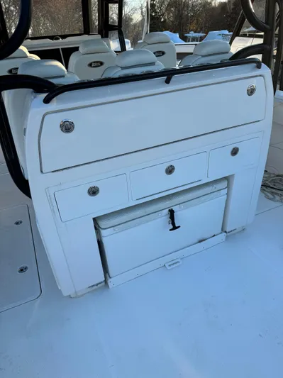  Yacht Photos Pics 2022 Invincible 40 Catamaran interior with storage compartments and seating.