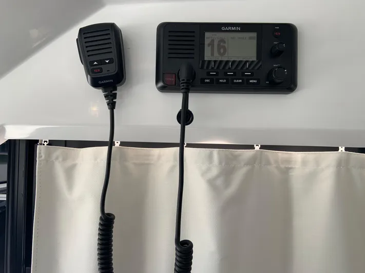  Yacht Photos Pics Garmin marine radio and microphone on Jeanneau NC 1095 Coupe, 2025 model.