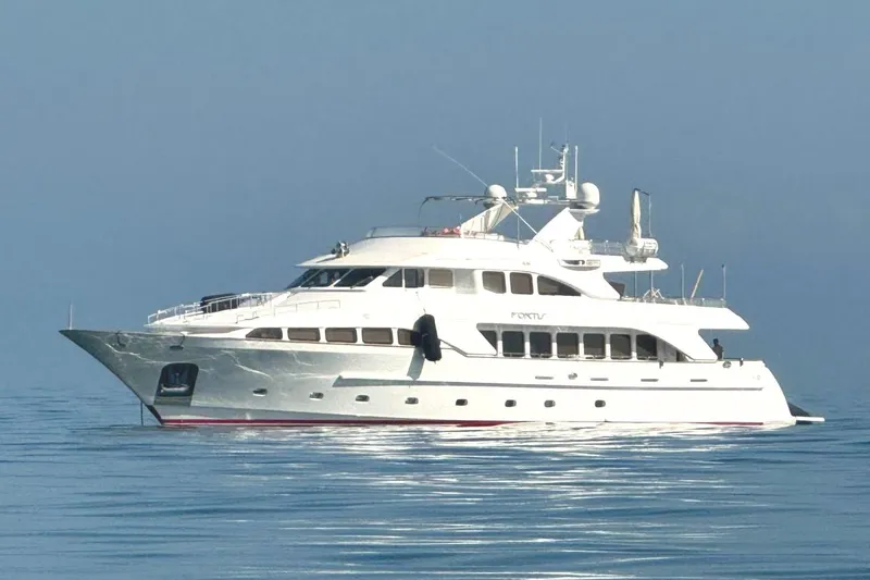 Fortis Benetti 115 Classic Yacht Photos Pics Luxury Benetti 115 Classic yacht from 2003 on calm blue waters.