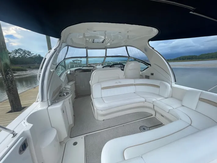 Maddie Janes Yacht Photos Pics 2009 Sea Ray 40 Sundancer yacht with spacious white seating and sleek design.
