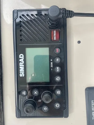 Maddie Janes Yacht Photos Pics Simrad marine radio on 2009 Sea Ray 40 Sundancer boat dashboard.