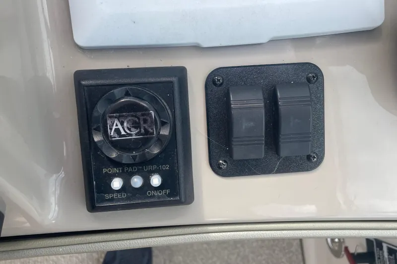 Maddie Janes Yacht Photos Pics Control panel of a 2009 Sea Ray 40 Sundancer boat with switches and dials.
