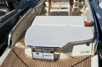 2023 Invictus GT280 boat for sale, docked at marina with wooden deck.