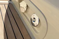 2023 Invictus GT280 yacht deck with water access panel.