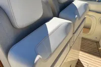 2023 Invictus GT280 boat seats with elegant white upholstery and logo.