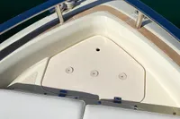 Bow of 2023 Invictus GT280 boat with sleek design and railing.
