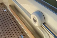 2023 Invictus GT280 boat deck with sleek design and wooden flooring.