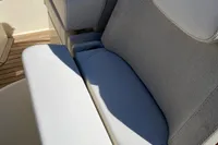 2023 Invictus GT280 boat seat with luxurious white and gray upholstery.