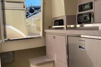 2023 Invictus GT280 yacht interior with modern cabinetry and sleek design.