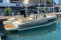 2023 Invictus GT280 boat docked at a marina, showcasing sleek design and modern features.