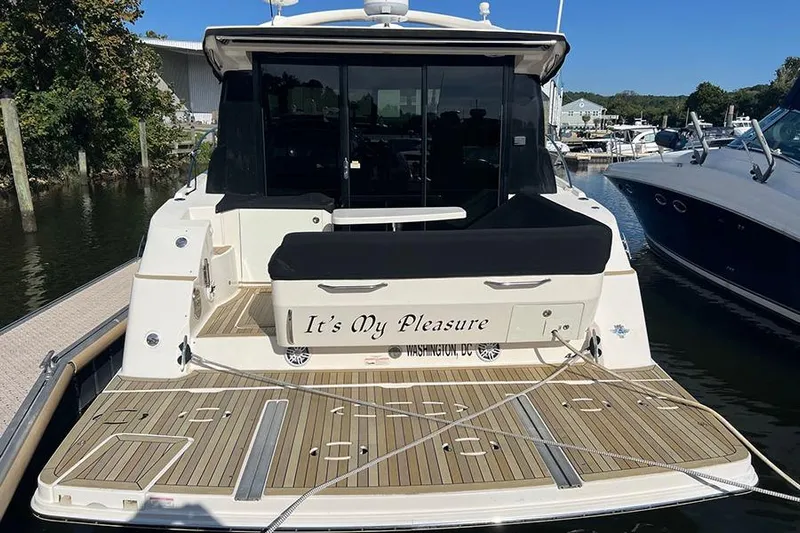  Yacht Photos Pics 2015 Sea Ray 470 Sundancer yacht docked, rear view with "It's My Pleasure" nameplate.