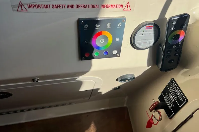  Yacht Photos Pics Control panel of a 2015 Sea Ray 470 Sundancer with safety information and remote.