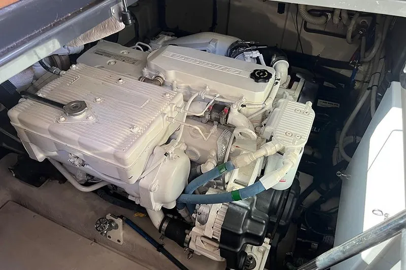  Yacht Photos Pics Engine compartment of a 2015 Sea Ray 470 Sundancer yacht, showcasing detailed machinery.