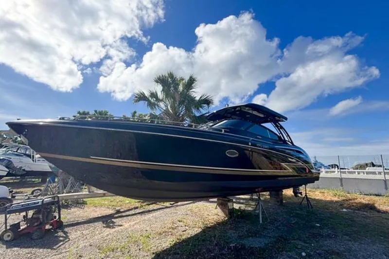 Cri Stellae Yacht Photos Pics 2018 Formula 350 Crossover Bowrider boat on display under a bright blue sky.